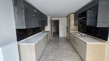 Modern and spacious kitchen area of a luxury duplex apartment in Istanbul Beylikduzu.