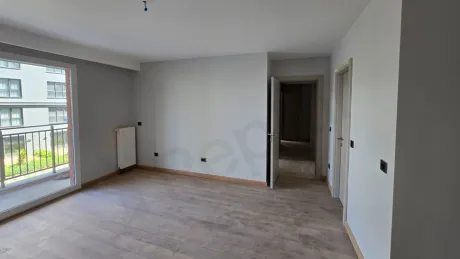 Spacious and airy bedroom view of a luxury duplex apartment.