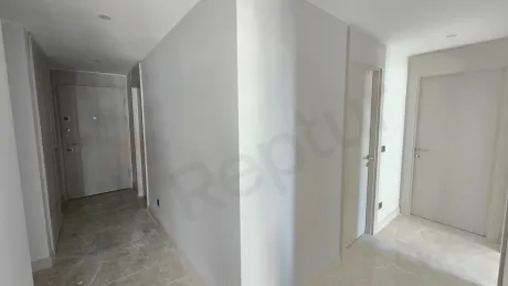 Spacious and bright bedroom of a modern duplex apartment for sale in Beylikdüzü, Istanbul.
