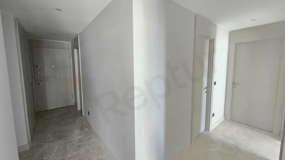 Spacious and bright bedroom of a modern duplex apartment for sale in Beylikdüzü, Istanbul.
