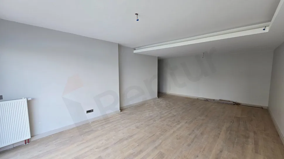 Spacious and bright living room area with modern architecture.