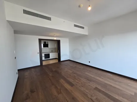 Modernly designed, spacious and bright dining room area.