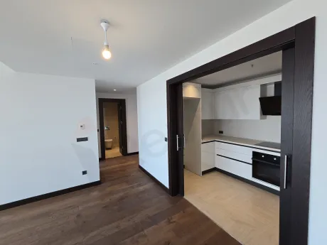 A dining room area with modern and spacious architecture.
