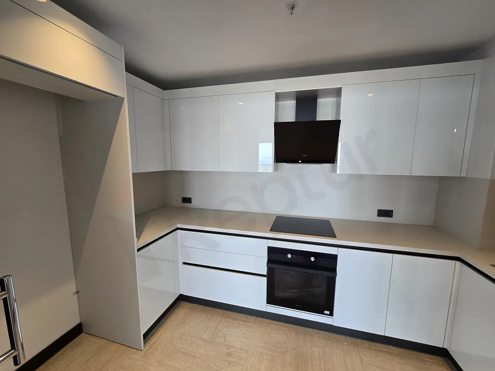Stylish and spacious kitchen area of a modern residence apartment in Şişli.