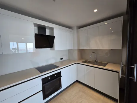 Spacious and bright kitchen area of a modern residence apartment in Sisli.