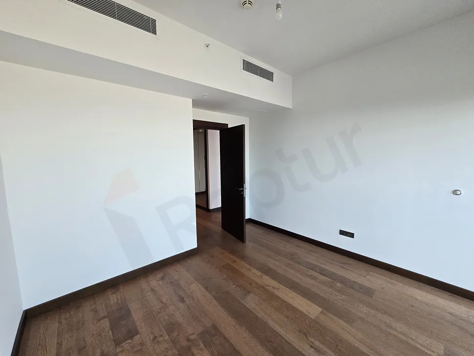 Modern and spacious bedroom image of a residence apartment located in Sisli, Istanbul.