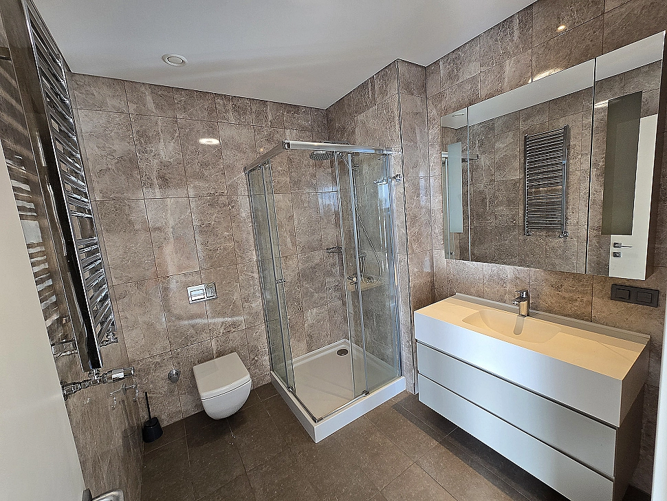 Modern designed, bright and spacious bathroom interior.