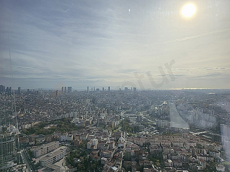 Interior view of a modern apartment with forest and sea view in Sarıyer.