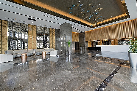 Modern building entrance with glass and metal details