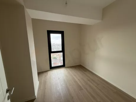 A modern, spacious, and bright bedroom interior design.