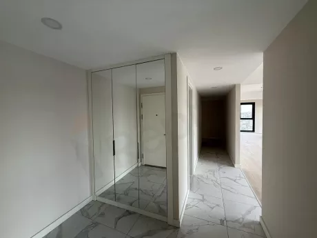 Entrance door and hallway of a modern apartment.