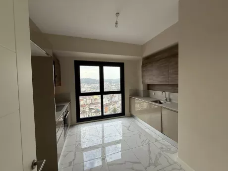 Modern designed, spacious and bright kitchen area.
