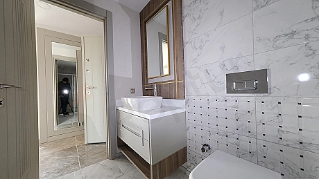 Bright and modern designed bathroom interior.