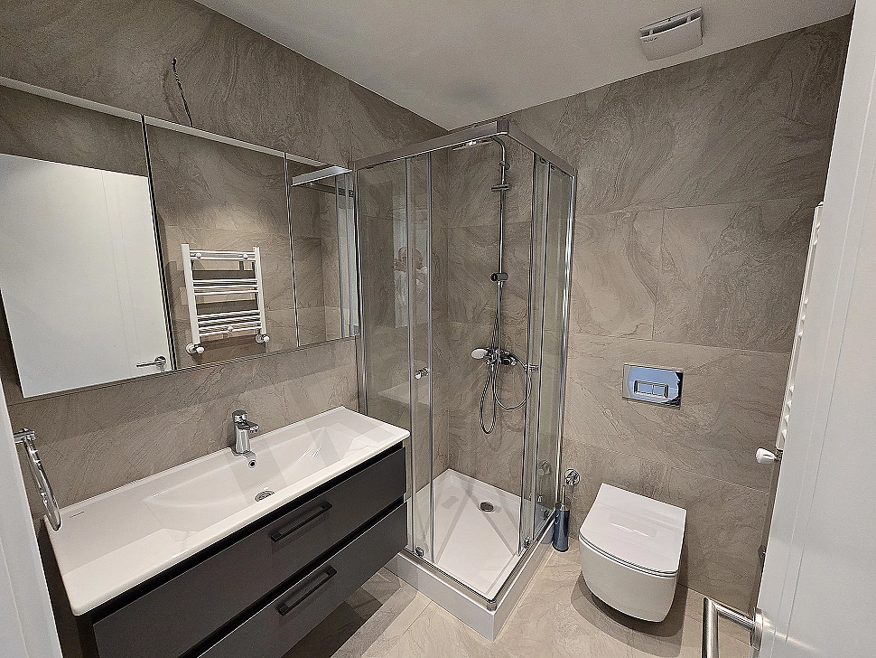 Image of a modern designed furnished bathroom.