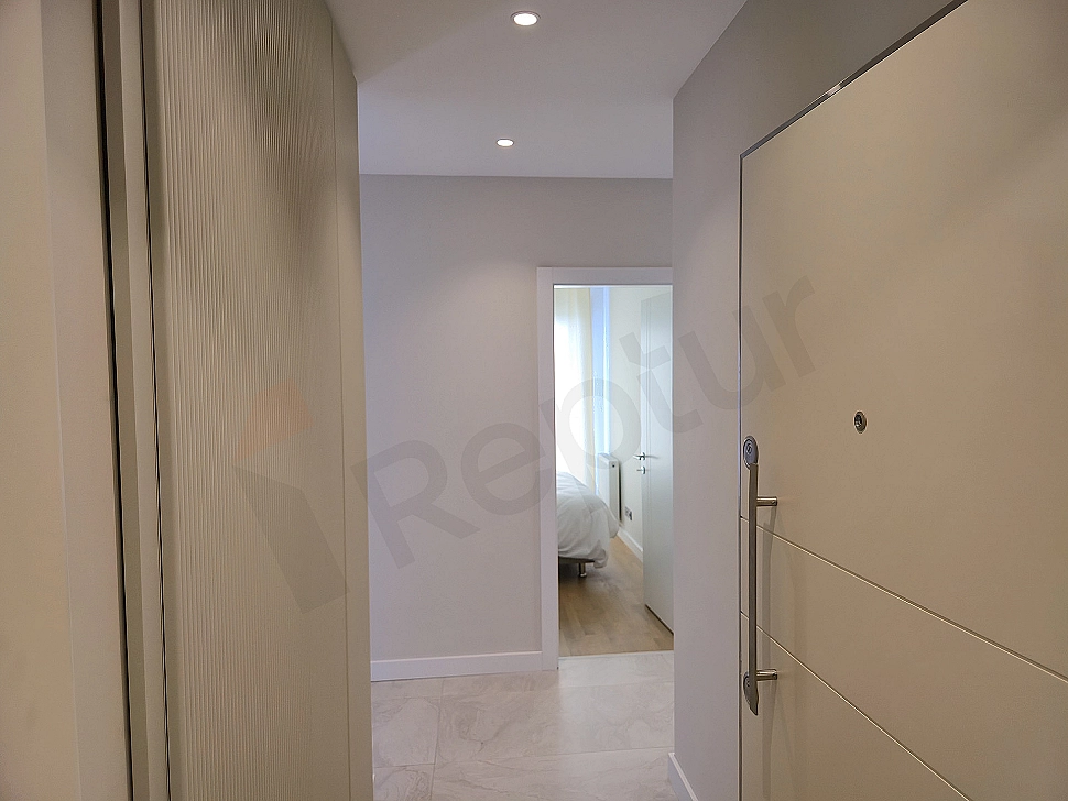 Furnished apartment entrance detail.