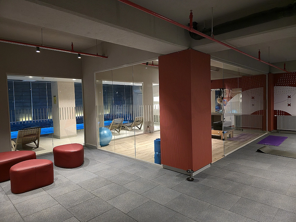 Gym view of furnished apartment.