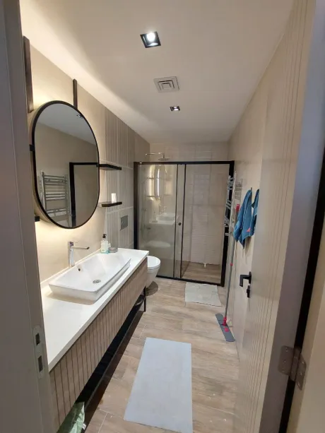 Interior view of a modern bathroom with contemporary fixtures and stylish design.