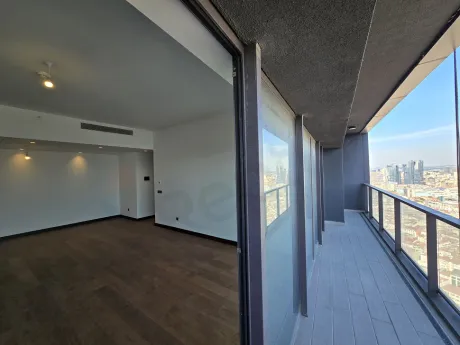 View of a modern residence balcony overlooking the city and the Bosphorus.