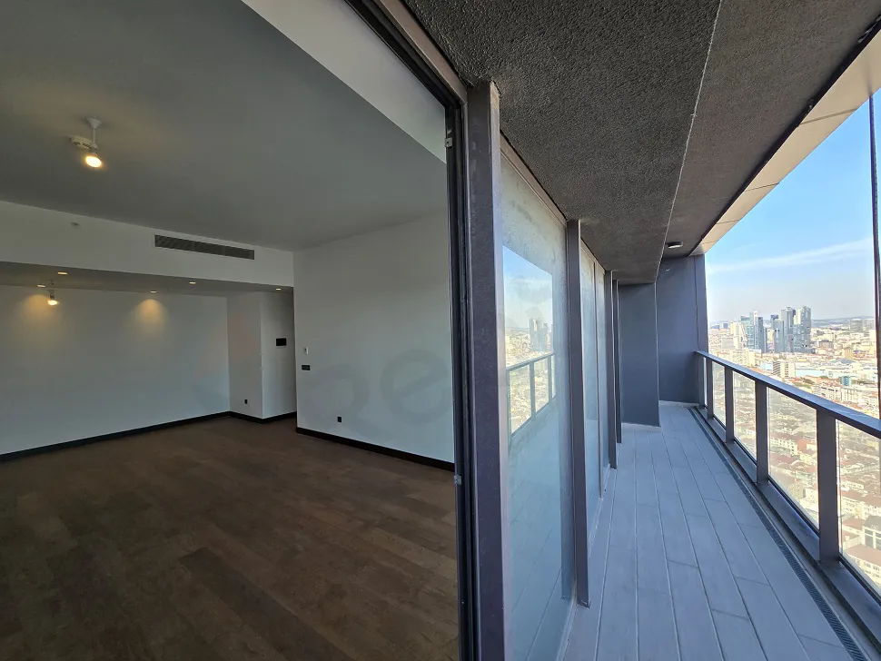 View of a modern residence balcony overlooking the city and the Bosphorus.