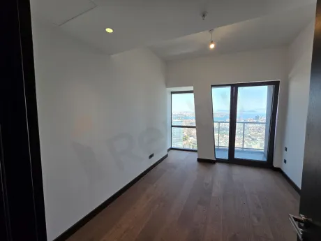Spacious and bright bedroom area of a modern residence apartment in Sisli, Istanbul.