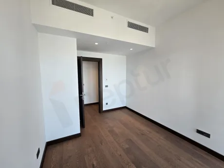 Modernly designed, spacious and bright bedroom interior.