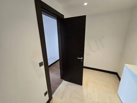 Spacious and organized storage area located in a modern residence project.