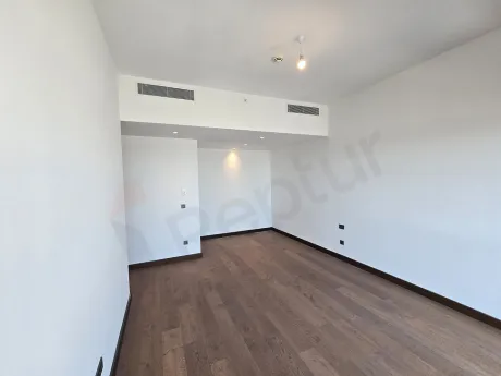 Interior view of a modern, spacious and bright bedroom.