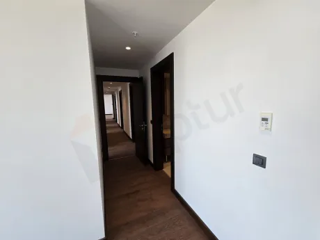 Bright and spacious empty hallway view of a modern luxury residence apartment.