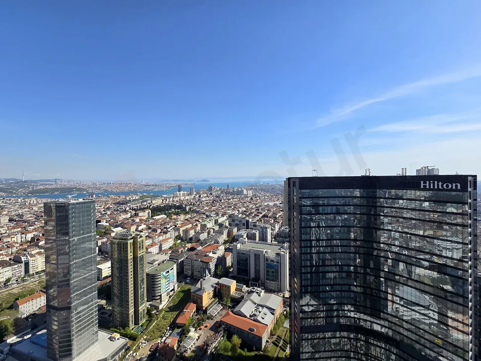 Panoramic view of the Bosphorus and Istanbul city skyline from a high vantage point.