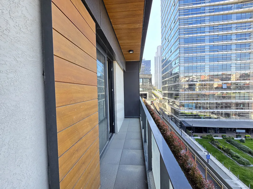 Spacious balcony of a luxury residence apartment for sale in Sisli with a city view.