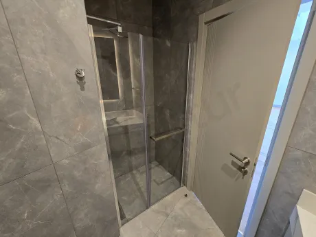 Modern and stylishly designed luxury residence bathroom with high-quality fixtures.