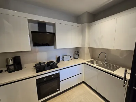 Modern designed, spacious and functional kitchen area.