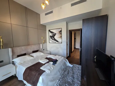 Modern and bright bedroom interior view.