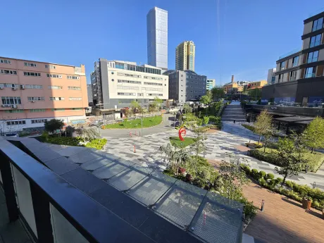 View of a spacious and modern balcony.