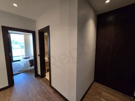 Stylish and minimalist interior staircase design inside a modern residence apartment.