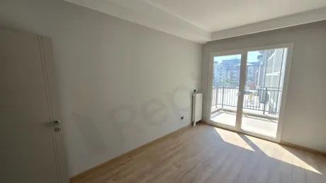 Modern and spacious bedroom interior view.