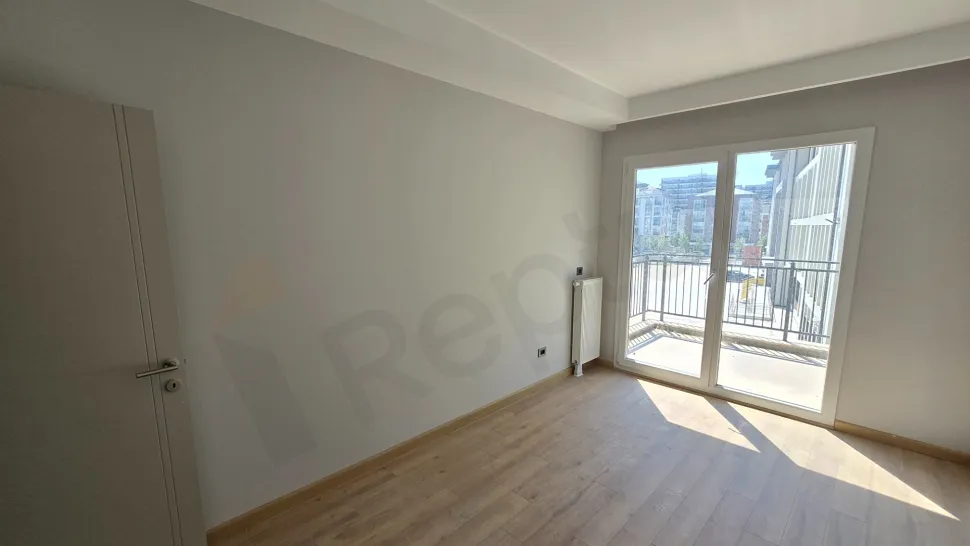 Modern and spacious bedroom interior view.