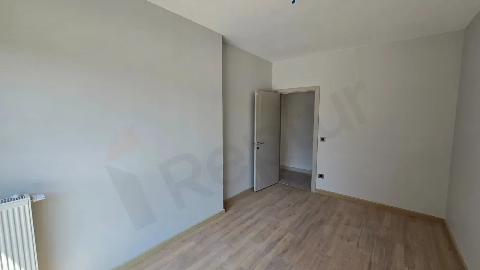 A modern and spacious bedroom interior with natural light in Beylikdüzü, Istanbul.