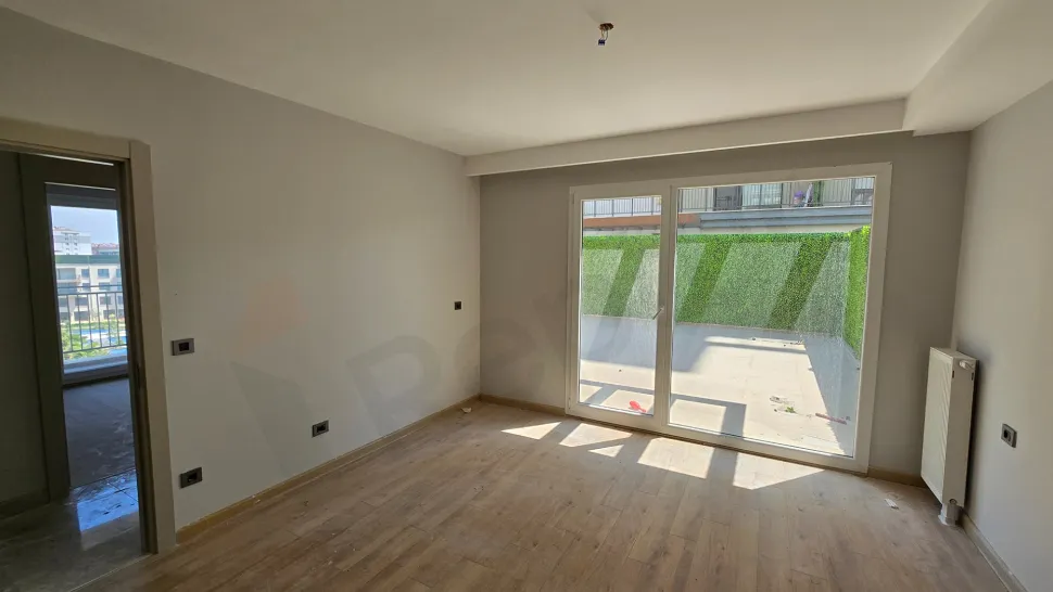 Modern design bedroom interior with large windows and a bright atmosphere.