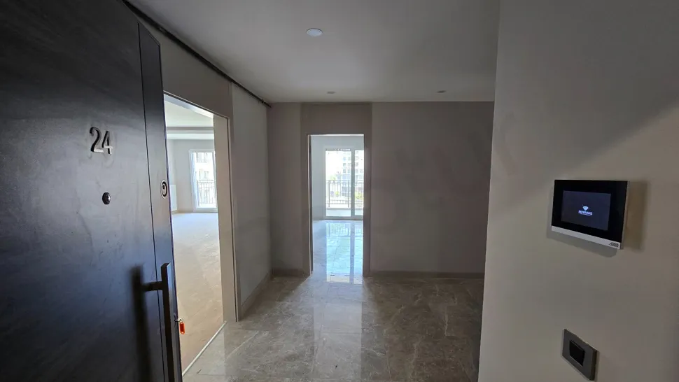 Entrance hall and doorway view of a modern apartment.