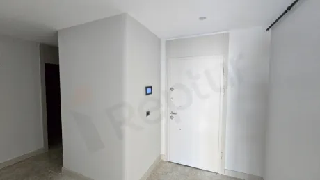 Entrance door and hallway area of a modern apartment.