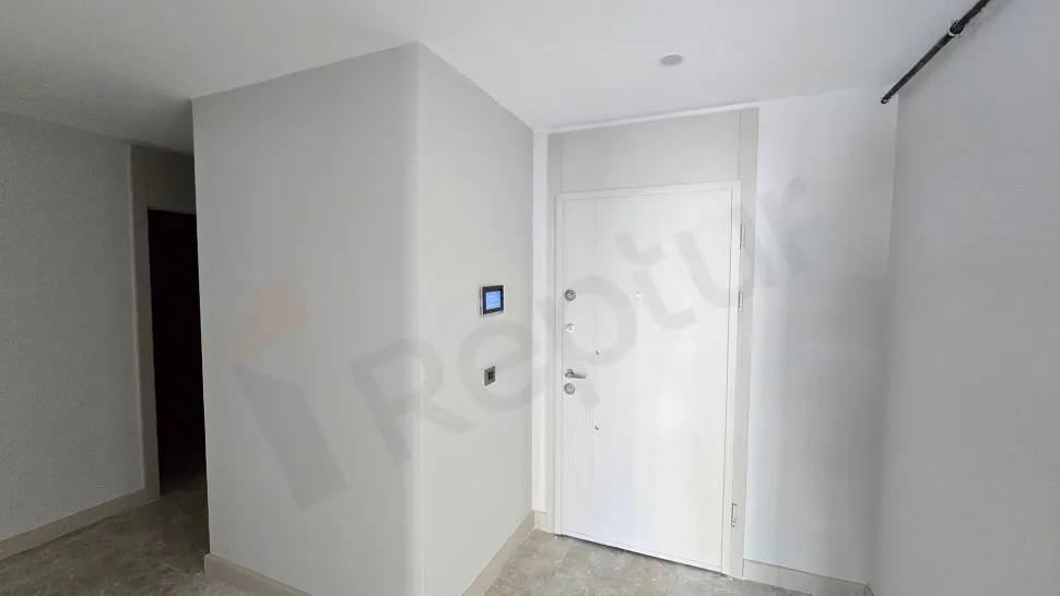 Entrance door and hallway area of a modern apartment.