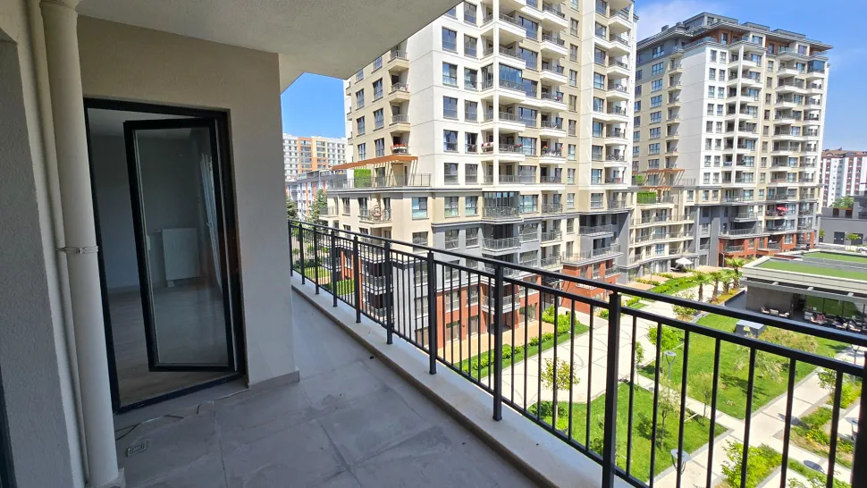 View of a spacious and modern apartment balcony.