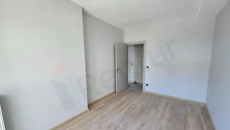Interior view of a modern and spacious bedroom.