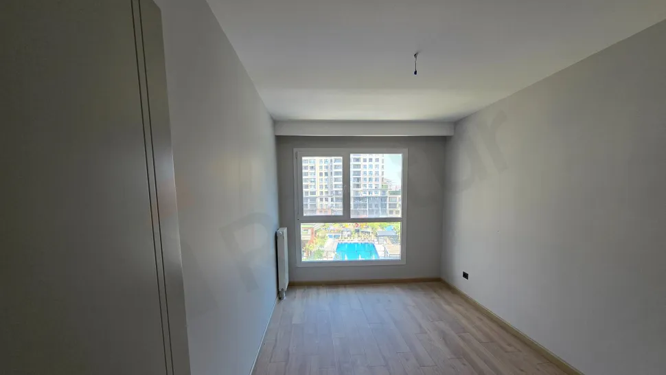 Spacious and modern bedroom interior.