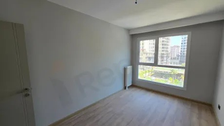 Interior view of a modern and spacious bedroom.
