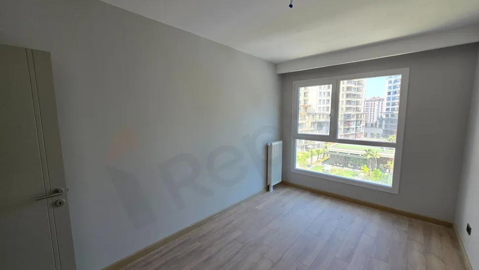 Interior view of a modern and spacious bedroom.