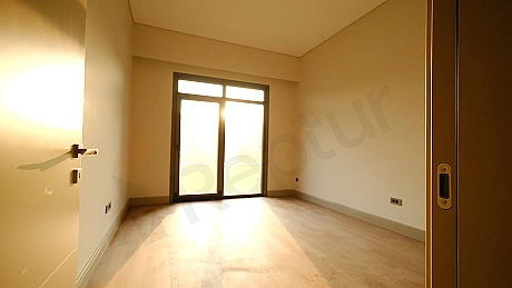 Image of a spacious and bright bedroom.