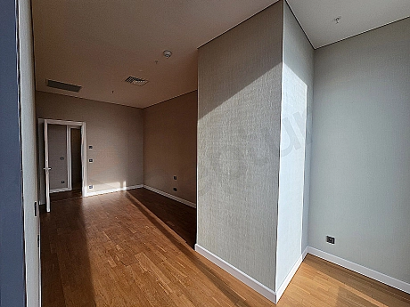 Modern designed, spacious and bright bedroom.