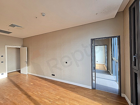 Modern bedroom interior, wooden floor, large window, and stylish decoration details